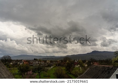 Beautiful dramatic sky over mountain valley