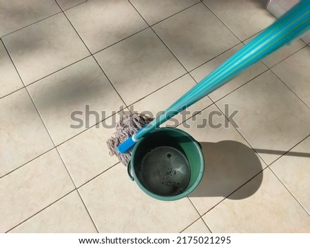 Floor mop containing deodorized soap and water