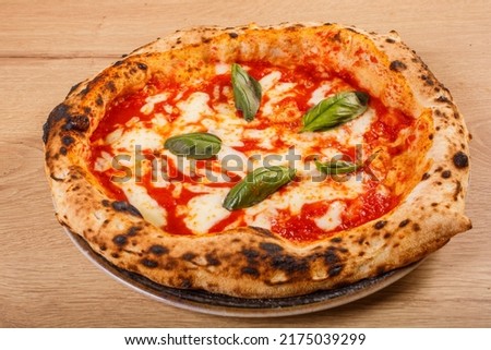 Pizza Margherita Napoletana with tomato sauce, buffalo mozzarella and fresh basil