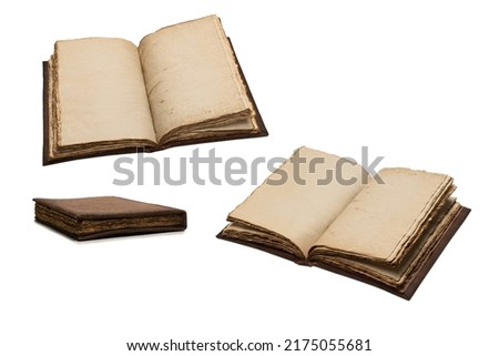 An open empty old notebook isolated on a white background. Copy space.   Royalty-Free Stock Photo #2175055681
