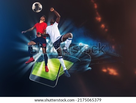 Watch a live sports event on your mobile device. Betting on football matches Royalty-Free Stock Photo #2175065379