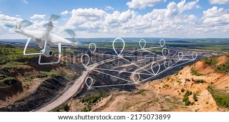 Innovation aerial uav drone copter flying with camera above opencast mining open coal. Concept engineering geology industry. Royalty-Free Stock Photo #2175073899