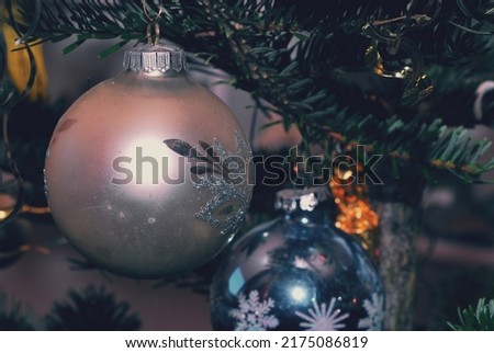 beautiful silver and blue ball on christmas tree decoration in winter