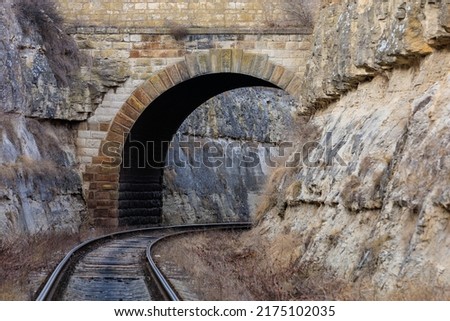 Railway tunnel in the canyon with an inscription in Russian, 1983. Background with copy space for text Royalty-Free Stock Photo #2175102035