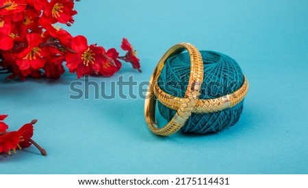 Indian design gold bangles decorative Royalty-Free Stock Photo #2175114431