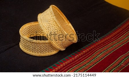 Indian design gold bangles decorative Royalty-Free Stock Photo #2175114449
