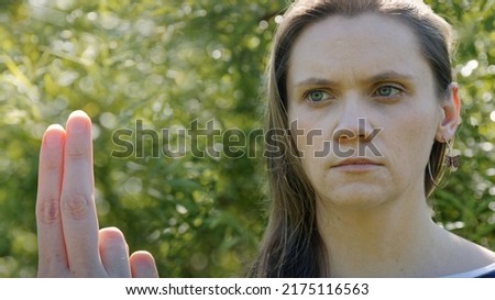 Female looking at therapist fingers. EMDR Eye Movement Desensitization and Reprocessing concept. Royalty-Free Stock Photo #2175116563