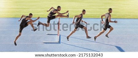 A male athlete jumping over a hurdle. Sequence of a fast professional sprinter or active track racer running over an obstacle. Sports man training for a track and field race on a sunny day Royalty-Free Stock Photo #2175132043