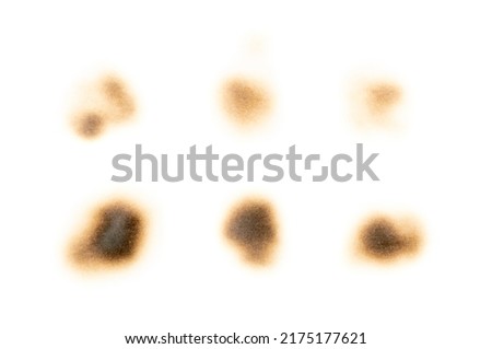 Burn paper mark isolated. Burnt sheet stain, burned parchment, burn paper texture background Royalty-Free Stock Photo #2175177621