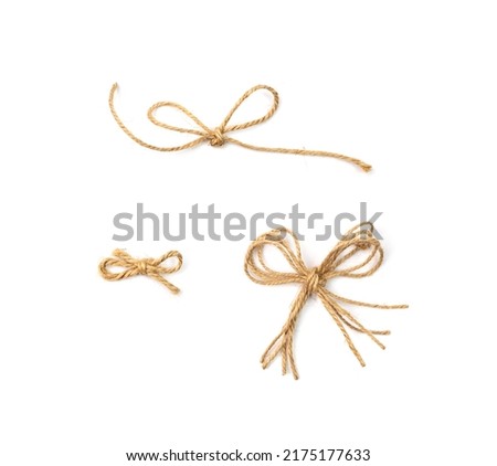 String bow isolated. Jute rope bows, packaging cord knots, knotted rustic gift, eco-friendly natural rope bow Royalty-Free Stock Photo #2175177633