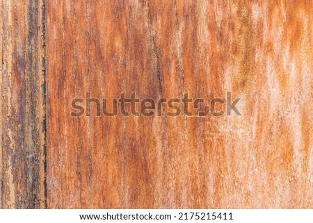 Stained wooden background, rustic wood planks texture top view.