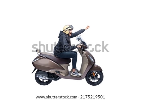 Asian woman with a helmet and jacket sitting on a scooter isolated over white background Royalty-Free Stock Photo #2175219501