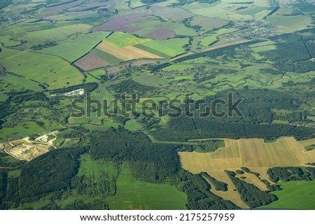 Agriculture Aerial View. Aerial photo rural landscape farms villages picturesque green patchwork pasture. aerial photography