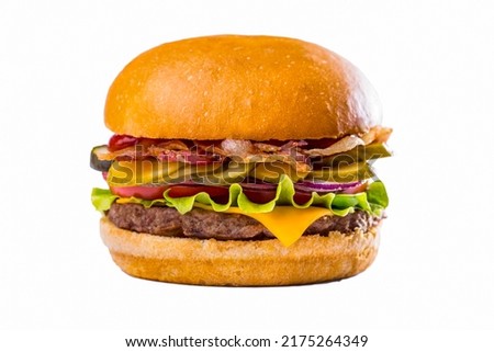 Burger with lettuce, meat cutlet, tomatoes, fried bacon, pickled cucumbers and cheese on a white background. Horizontal orientation