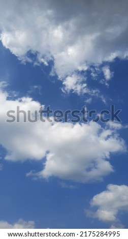 Blue sky and white clouds background 