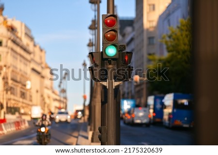 Green traffic light in the middle of a cross. Transportation industry.