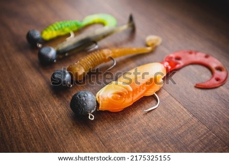Fishing bait for fishing with spinning. Soft plastic twisters for jig heads. Royalty-Free Stock Photo #2175325155
