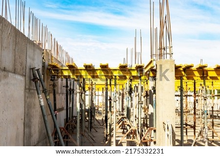 Formwork for pouring the second floor of a monolithic building. Reinforcement of walls and ceiling. Monolithic work during the construction of a building close-up. Construction technologies