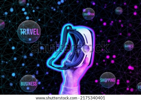 The metaverse. A glowing male hand holds VR glasses. Black background with neon abstract grid and spheres of interest. The concept of choice, cyberspace and virtual reality.