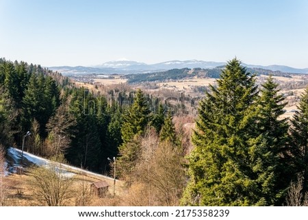 Amazing breathtaking aerial panoramic view on the mountains, forest, village from observation deck in Poland, Rabka-Zdroj