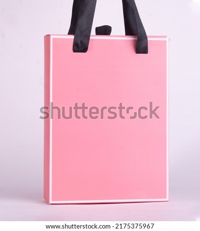 pink paper shopping bag set with different angles. Front View of retail purchase packaging - blank mockup with empty space and rope handle, isolated realistic vector illustration