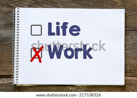 Notebook with checklist on table,Life or Work decision