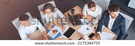 top view photo of business people in modern it office on meeting. High quality photo Royalty-Free Stock Photo #2175384755