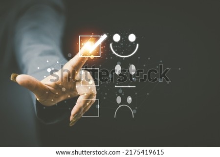 Customer service and Satisfaction concept women's hands doing online assessments in the satisfaction rating the popular service company allows customers in order to improve and develop the organizatio Royalty-Free Stock Photo #2175419615