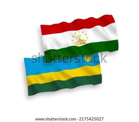 National vector fabric wave flags of Republic of Rwanda and Tajikistan isolated on white background. 1 to 2 proportion.