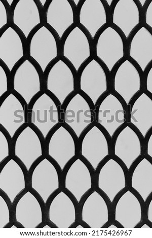 Unusual vintage grid pattern in black and white high contrast.