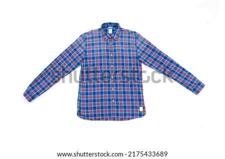 checkered shirt or plaid shirt close up on white background 