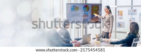 An Asian businesswomen is presenting his company performance report to his boss or group of male and female colleagues with confidence and professionalism web banner with copy space on left