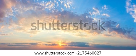 Real sundown sunset  sky with beautiful light clouds and sun, wothout any birds. Huge resolutions Royalty-Free Stock Photo #2175460027