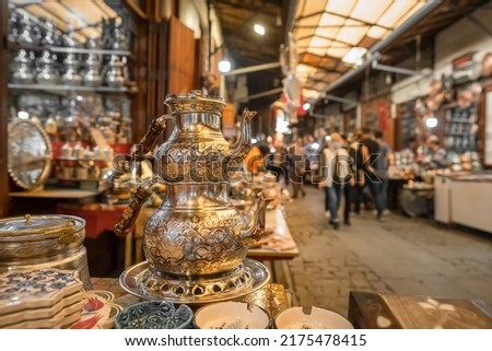 Coppersmith Bazaar of Gaziantep, Turkey. Handmade copper products and shopping center. Historical coppersmith shopping center. Tea pot close-up Royalty-Free Stock Photo #2175478415