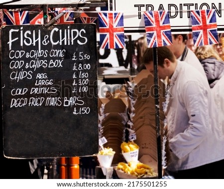 Fish and Chips Food Stall in Camden Market Royalty-Free Stock Photo #2175501255