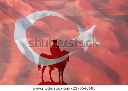 Turkish Flag with Monument of Mustafa Kemal Ataturk. Turkish National or public Holidays concept. 19th may or 19 mayis and 30th august victory day or 30 agustos zafer bayrami background. Royalty-Free Stock Photo #2175548583