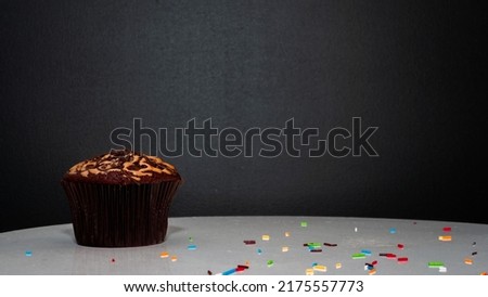 Muffin on black background copy space, copy space pie