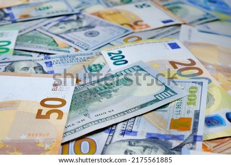 Money. Euro and us dollars banknotes. Background of dollars and european currency