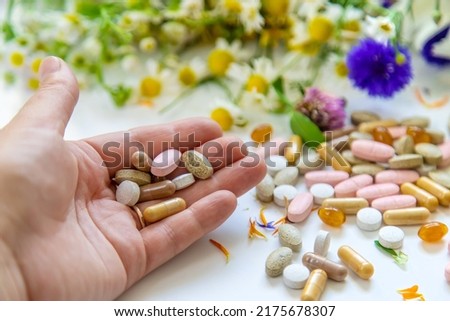Homeopathy and dietary supplements from medicinal herbs. Selective focus. Nature.