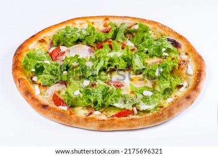 Pizza with fried egg, salad, tomatoes, cheese and pepper on a white background