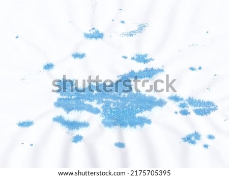 Abstract blue paint grunge background. Abstract blue paint stains on white background. Artwork made of mixed media on white paper..