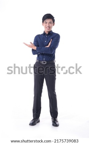 
Full body 
portrait of young businessman in suit with welcome gesture standing posing white background
