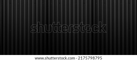 Panorama of Black Corrugated metal texture surface or galvanized steel. black iron fence. Black vertical line texture. Royalty-Free Stock Photo #2175798795