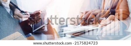 close up of businesswoman working with smart phone and laptop and digital tablet computer in modern office with virtual icon diagram