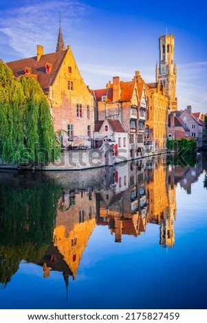 Bruges, Belgium. Golden hour landscape with beautiful Rozenhoedkaai in Brugge, famous Flanders landmark. Royalty-Free Stock Photo #2175827459