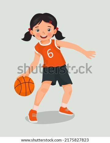 cute little girl with sportswear playing basketball dribbling the ball in action Royalty-Free Stock Photo #2175827823