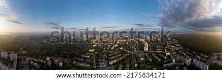 Sunny morning cityscape extra wide panorama in city residential district. Aerial colorful view above buildings and streets, Pavlovo Pole, Kharkiv Ukraine Royalty-Free Stock Photo #2175834171