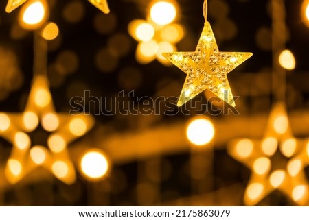 Beautiful Star shape lighting soft focus on dark background. Royalty-Free Stock Photo #2175863079