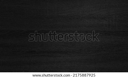 dark black melamine wood texture use as background. abstract rough wood material for interior finishing, furnishing works. wood texture with natural pattern for inner design and background. Royalty-Free Stock Photo #2175887925
