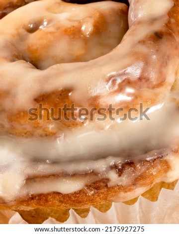 Cinnamon Roll closeup macro image with icing details 